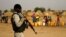 FILE - A Nigerien soldier stands guard in a camp in the city of Diffa following attacks by Boko Haram fighters in Niger's Diffa region, June 18, 2016.