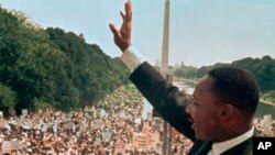 FILE - Dr. Martin Luther King Jr. acknowledged the crowd at the Lincoln Memorial for his "I Have a Dream" speech during the March on Washington, Aug. 28, 1963.