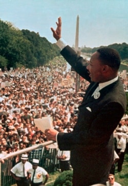 FILE - Dr. Martin Luther King Jr. acknowledged the crowd at the Lincoln Memorial for his "I Have a Dream" speech during the March on Washington, Aug. 28, 1963.