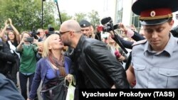 RUSSIA -- Russian theatre director Kirill Serebrennikov (C), who was accused of embezzling state funds and placed under house arrest, is escorted after a court hearing in Moscow, Russia September 4, 2017