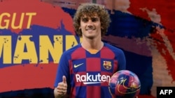 Antoine Griezmann lors de sa présentation au Camp, Espagne le 14 juillet 2019.