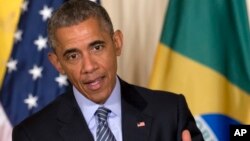 President Barack Obama speaks during his joint news conference with Brazilian President Dilma Rousseff, June 30, 2015, in the East Room of the White House in Washington. 