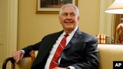 FILE - Secretary of State-designate Rex Tillerson pauses during a meeting with Senate Majority Leader Mitch McConnell of Kentucky on Capitol Hill in Washington, Jan. 4, 2017.
