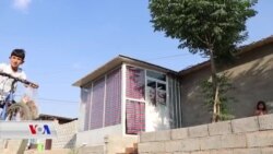 ئارایشگایەک لە نێو کەمپێکی پەنابەراندا