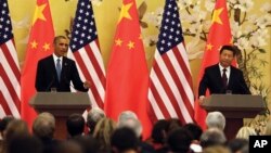 美國總統奧巴馬（左）和中國國家主席習近平（右）在聯合記者會上。