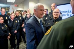 Vice President Mike Pence greets U.S. Customs and Border Protection employees at their headquarters in Washington, Jan. 11, 2019.