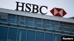 HSBC Holdings Plc admitted on February 8, 2015 failings by its Swiss subsidiary, in response to media reports it helped wealthy customers dodge taxes and conceal millions of dollars of assets. REUTERS/Pierre Albouy (SWITZERLAND - 