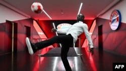 FILE - Bayern Munich's Senegalese forward Sadio Mane playing the ball during a press conference after he signed a three-year deal with German first division football club FC Bayern Munich, in Munich, southern Germany. on June 22, 2022