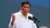 FILE - Philippine President Rodrigo Duterte gestures during his address to a Filipino business sector in suburban Pasay city south of Manila, Philippines.