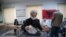 A woman casts her ballot during parliamentary elections in capital Tirana, Albania, April 25, 2021. 