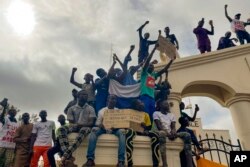 FILE - Supporters of Niger's ruling junta gather at the start of a protest called to fight for the country's freedom and push back against foreign interference in Niamey, Niger, Aug. 3, 2023.