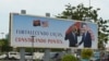 A poster showing a picture of Angola President João Lourenço shaking hands with US President Joe Biden is seen in Luanda on Dec. 2, 2024 ahead of the arrival of the American President in Angola. 