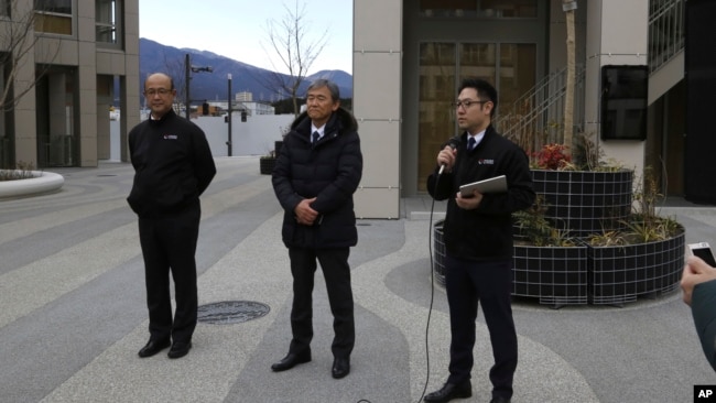 Toyota ｅxecutives in charge of Woven City, from left to right, Woven by Toyota CFO Kenta Kon, CEO Hajime Kumabe and Head of Woven City Management Daisuke Toyoda speak to reporters in Susono, Japan Feb. 22, 2025. (AP Photo/Yuri Kageyama)