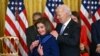 TOPSHOT - US President Joe Biden presents the Presidential Medal of Freedom to US Representative Nancy Pelosi (D-CA) in the East Room of the White House in Washington, DC, on May 3, 2024.