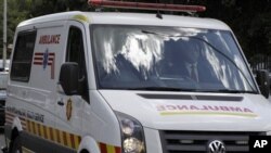 The ambulance carrying former South African President Nelson Mandela leaves Milpark hospital in Johannesburg, South Africa, Jan 28, 2011