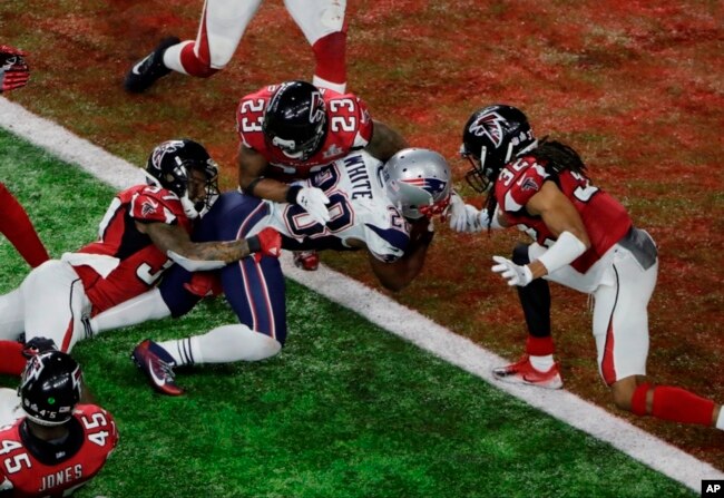 James White scores the winning touchdown for New England.