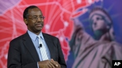 FILE - Ben Carson arrives to speak during the Conservative Political Action Conference (CPAC) in National Harbor, Maryland.