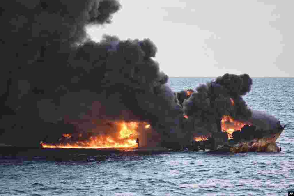 In this photo provided by China&#39;s Ministry of Transport, the burning Iranian oil tanker Sanchi is seen partially sunk in the East China Sea off the eastern coast of China, Jan. 14, 2018.