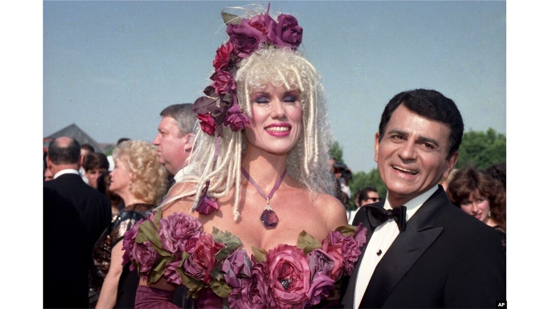 FILE - Casey Kasem, along with his wife, Jean Kasem, arrives at the Emmy Awards in Los Angeles. Kasem, the smooth-voiced radio broadcaster who became the king of the top 40 countdown, died at age 82, June 15, 2014.