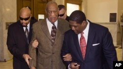 Actor and comedian Bill Cosby, center, arrives for a court appearance in Norristown, Pennsylvania, Feb. 2, 2016.
