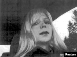 U.S. Army Private First Class Bradley Manning is pictured dressed as a woman in this 2010 photograph obtained on Aug. 14, 2013.
