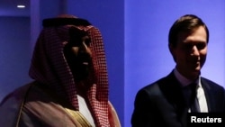 FILE - Saudi Arabia's Prince Mohammed bin Salman escorts White House senior advisor Jared Kushner at the Global Center for Combatting Extremist Ideology in Riyadh, Saudi Arabia May 21, 2017. 