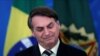 Bolsonaro visita un mercado para insistir en que "Brasil no puede parar"