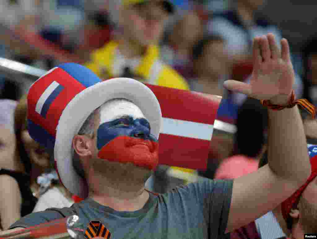 A Russian fan supports his team during the 2016 IIHF World Championship, Group A - Latvia vs Russia Ice Hockey game in Moscow.