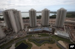 FILE - The 2016 Olympics Athletes' Village is seen under construction in Rio de Janeiro, Brazil, July 23, 2015.