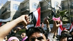 Opposition supporters shout slogans during an anti-government protest in Sana'a, February 3, 2011