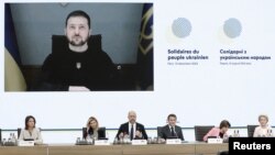 Zonja e Parë e Ukrainës merr pjesë në takim ndërsa Presidenti ukrainas Zelensky është lidhur nëpërmjet një videokonference (Paris, 13 dhjetor 2022)