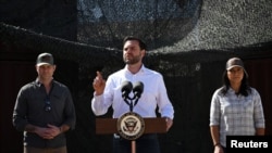 US Vice President JD Vance speaks as Defense Secretary Pete Hegseth and Director of National Intelligence Tulsi Gabbard look on during a visit to the US-Mexico border in Eagle Pass, Texas, March 5, 2025. 