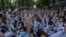 High school students flash the three-fingered salute, symbol of resistance, during a protest rally in Bangkok, Thailand, Sept. 5, 2020.