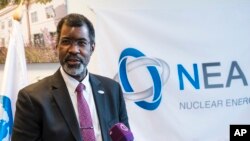 FILE - Director General of Nuclear Energy Agency (NEA) of the Organization for Economic Co-operation and Development (OECD) William D. Magwood holds a press conference in Budapest, Hungary, March 5, 2018. 