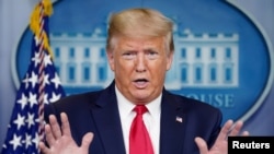 U.S. President Donald Trump addresses the daily coronavirus task force briefing at the White House in Washington, U.S., April 8, 2020. 