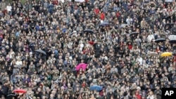 Demonstrators protest against the Scientific and Technological Research Council of Turkey [TUBITAK] over the exclusion of articles commemorating Charles Darwin's 200th birthday from a scientific journal published by TUBITAK, in Ankara, Turkey, March 2009.