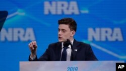FILE - Kyle Kashuv, survivor of the Stoneman Douglas High School shooting, speaks at the National Rifle Association Institute for Legislative Action Leadership Forum in Lucas Oil Stadium in Indianapolis, April 26, 2019.