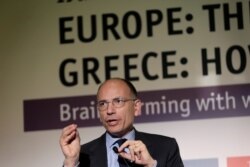 Former Italian Premier Enrico Letta gives a speech during an economic conference in Athens, May 14, 2015.