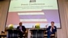 Rohana Nishanta Hettiarachchie, left, secretary general of The Asian Network for Free Elections (ANFREL) watches as Amael Vier, program officer for Capacity Building, right, speaks during a press conference concluding their election monitoring in Bangkok