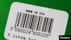 FILE - A bar code affixed to a plastic tote is pictured in San Diego, California.