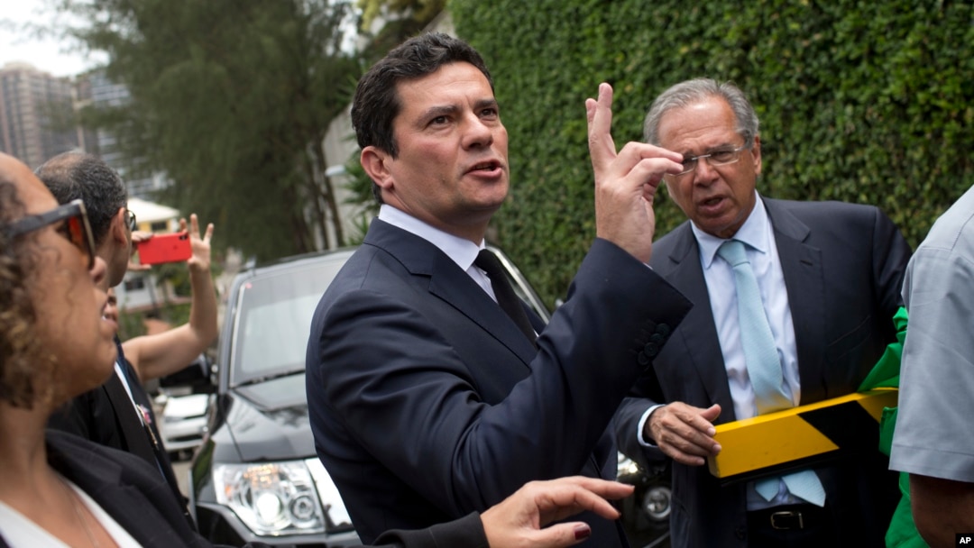 Judge Sergio Moro talks to the press as he exits a meeting with President-elect Jair Bolsonaro, outside Bolsonaro's home in Rio de Janeiro, Brazil, Nov. 1, 2018.