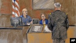 In this courtroom sketch, Juan Velez, left, the father of Pvt. Francheska Velez who was killed in the 2009 Fort Hood shootings, appears during the sentencing phase of Maj. Nidal Hasan's trial, Aug. 26, 2013, in Fort Hood, Texas. 