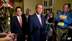 House Majority Leader Eric Cantor (L), House Majority Whip Kevin McCarthy and Speaker of the House John Boehner, during a news conference on Capitol Hill, Oct. 1, 2013.