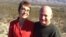 In this photo provided by the office of U.S. Rep. Gabrielle Giffords, Giffords and husband Mark Kelly pose at the Davidson Canyon Gabe Zimmerman Memorial outside of Tucson, Arizona, Jan. 7, 2012.