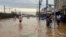 This handout picture released by the Canoas City Hall shows people helping to rescue flood victims in Canoas, Rio Grande do Sul state, Brazil on May 4, 2024.