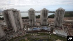 FILE - The 2016 Olympics Athletes' Village is seen under construction in Rio de Janeiro, Brazil, July 23, 2015. 
