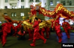 Participants perform a dragon dance during the celebration on the eve of the Lunar New Year, in Moscow, Russia, on Jan. 28, 2025.