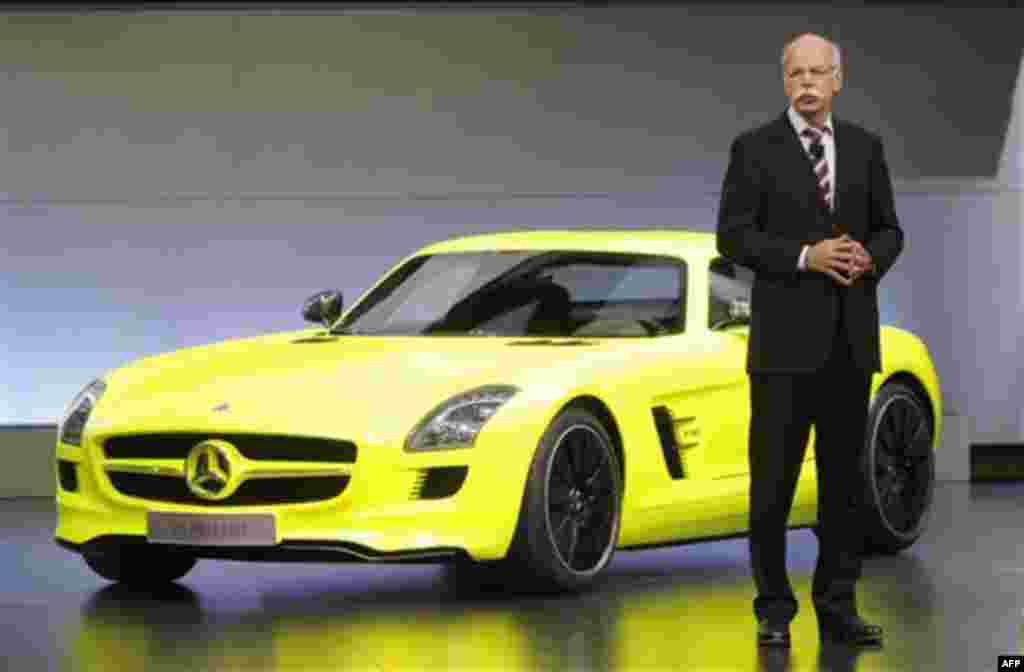 Dieter Zetsche, Chairman of the Board of Management of Daimler AG and Head of Mercedes-Benz Cars introduces the Mercedes Benz SLS AMG E-Cell at the North American International Auto Show in Detroit, Monday, Jan. 10, 2011. (AP Photo/Paul Sancya)