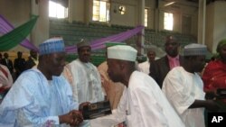Marigaryi Gwamnan jihar Kaduna Patrick Yakowa  a cikin shudiyar riga