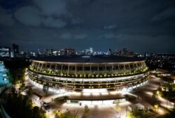A general view of the National Stadium in preparation for the Tokyo 2020 Olympic Games in Tokyo, Japan, June 23, 2021 on the day to mark one month until the opening of the Olympic Games.